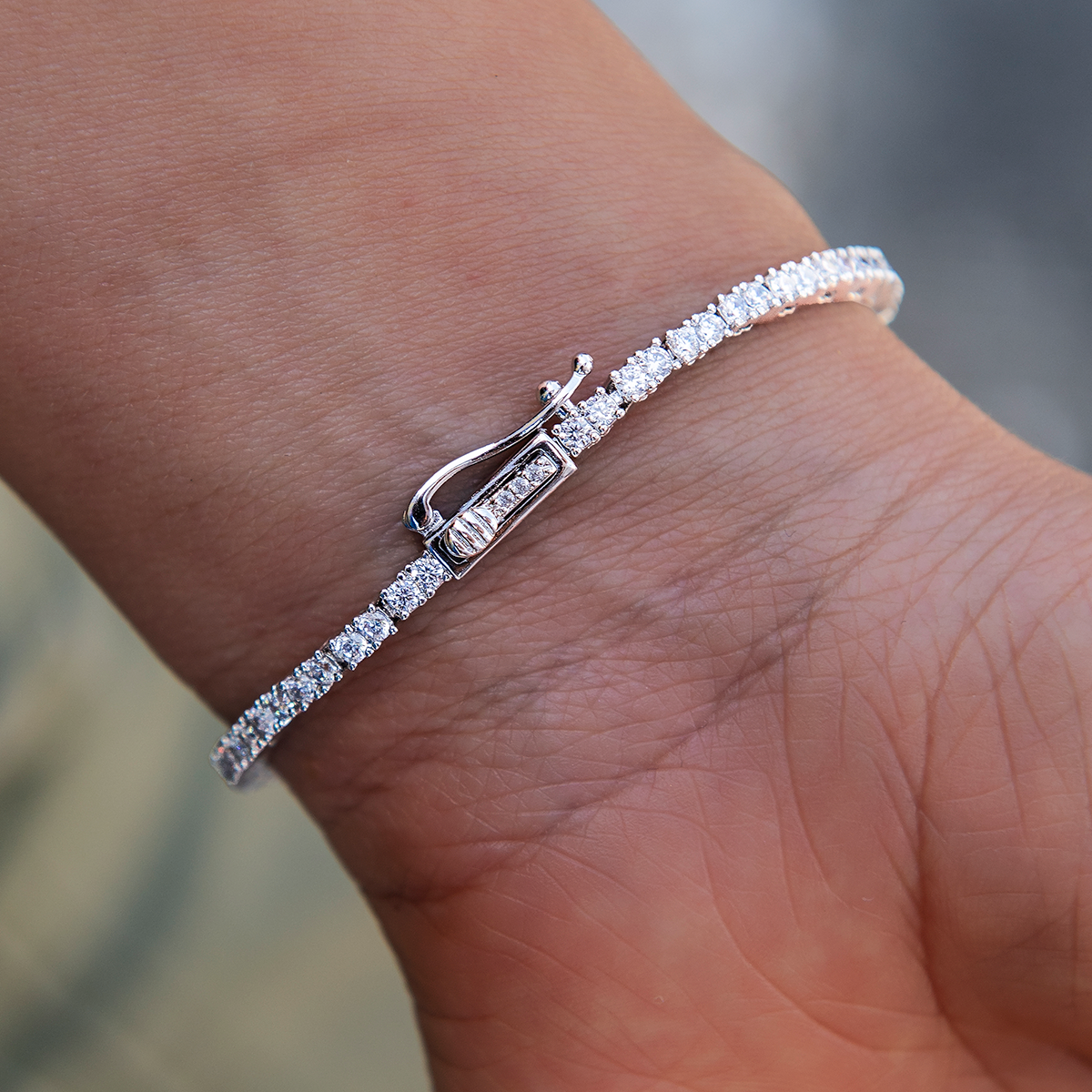 Blue Iced Rock Diamond Tennis Bracelet in White Gold